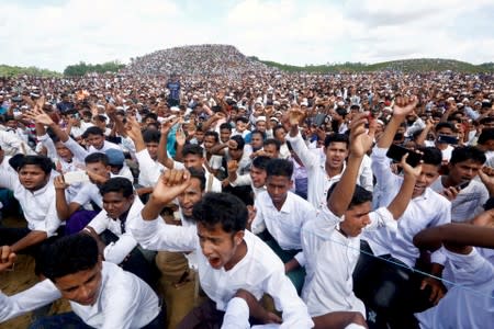 FILE PHOTO: Rohingya refugees shout slogans as they gather to mark the second anniversary of the exodus at the Kutupalong camp in Cox’s Bazar