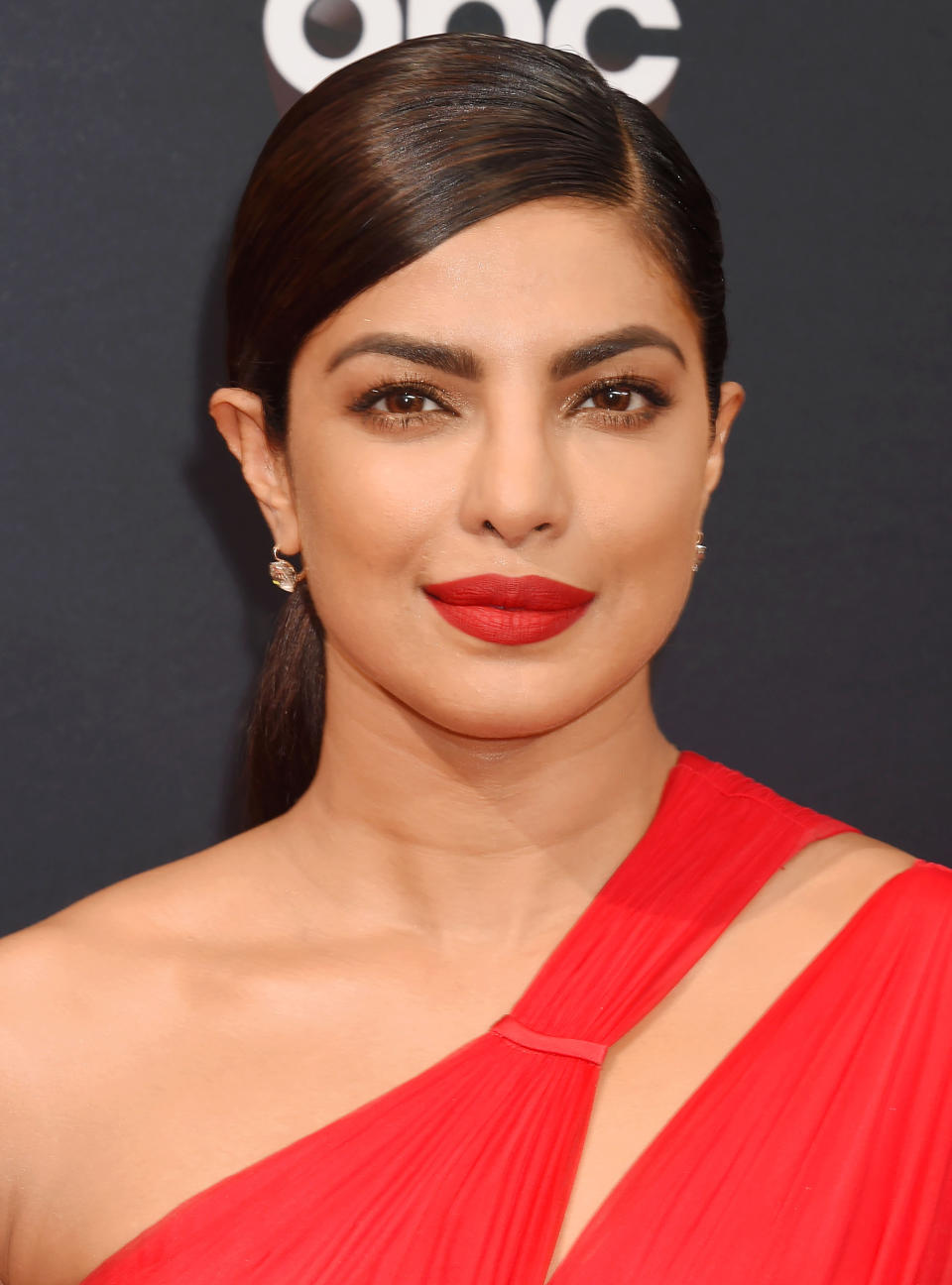 <p>Chopra's matte red lip demonstrates why the shade will always be a red carpet classic. For the Emmy awards, the actress swiped on Chanel Rouge Allure Velvet Intense Long-Wear Lip Colour in Rouge Charnel.</p>