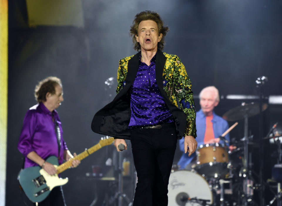 Mick Jagger of the Rolling Stones walks the stage as bandmates Keith Richards, left, and Charlie Watts perform during the concert at the Rose Bowl, Thursday, Aug. 22, 2019, in Pasadena, Calif. (Photo by Chris Pizzello/Invision/AP)