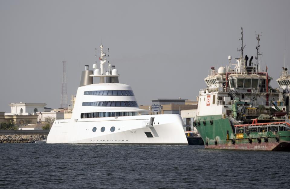 The 118-meter (387-foot) Motor Yacht A belonging to Russian oligarch Andrey Melnichenko is anchored in the port of Ras al-Khaimah, United Arab Emirates, Tuesday, May 31, 2022. In the dusty, northern-most sheikhdom of the United Arab Emirates, Motor Yacht A, one of the world's largest yachts, sits in the quiet port — so far avoiding the fate of other luxury vessels linked to sanctioned Russian oligarchs. (AP Photo/Kamran Jebreili)