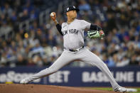New York Yankees pitcher Luis Gil delivers during the first inning of a baseball game against the Toronto Blue Jays in Toronto on Monday, April 15, 2024. (Christopher Katsarov/The Canadian Press via AP)