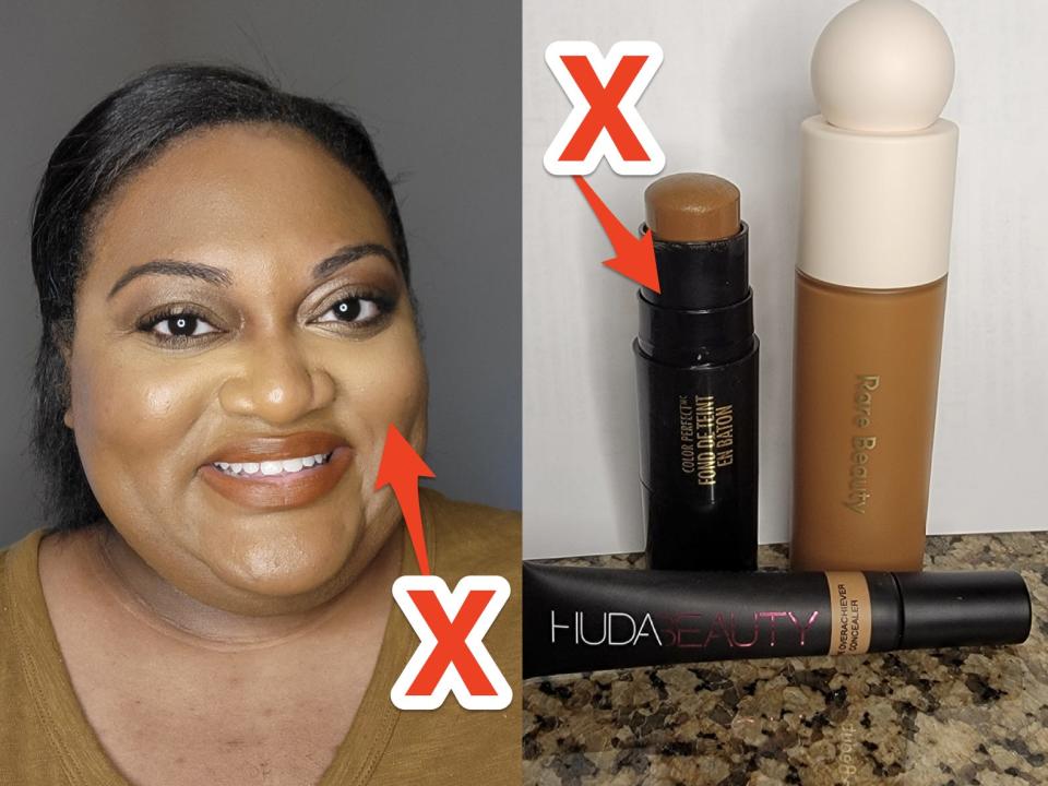 The writer wears a full face of makeup and a red arrow and X points to her lipstick; A Black Radiance foundation stick, a Rare Beauty foundation stick, and a Huda Beauty concealer stick on a counter with a red X and arrow pointing to them