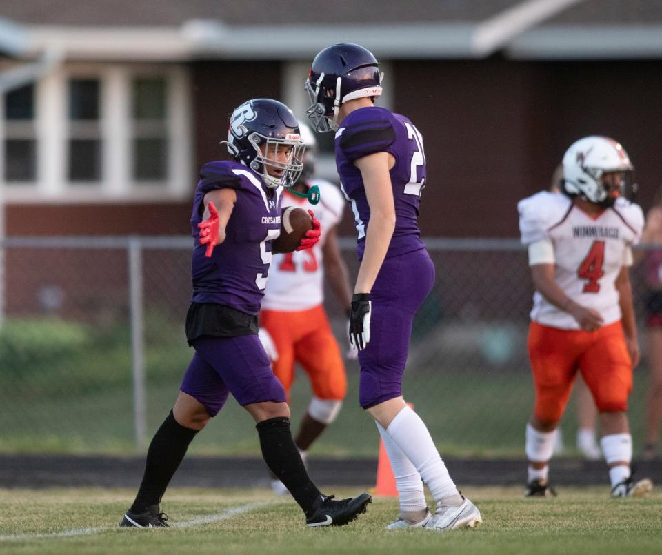 Lutheran's Gavin Sanders celebrates a touchdown against Winnebago on Friday, Aug. 25, 2023, at Lutheran High School in Rockford.