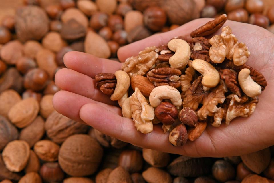 Nuts are a fail-safe go-to as they are crammed with gut-loving fibre (PA Archive)