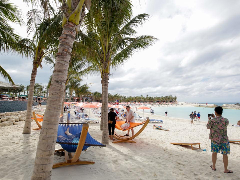 people on hammocks at Royal Caribbean Perfect Day at CocoCay's Hideaway Beach