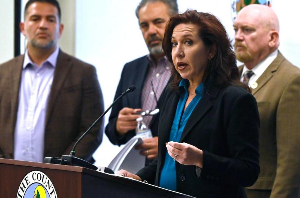 Reedley City Manager Nicole R. Zieba, second from right, speaks at a press conference to discuss a congressional subpoena for documents and material related to an illegal laboratory discovered last year in the city. Also attending are, from left, Fresno County assistant health department director Joe Prado, director David Luchini, and Fresno County Supervisor Steve Brandau. Photographed Wednesday, Sept.13, 2023 in Fresno.