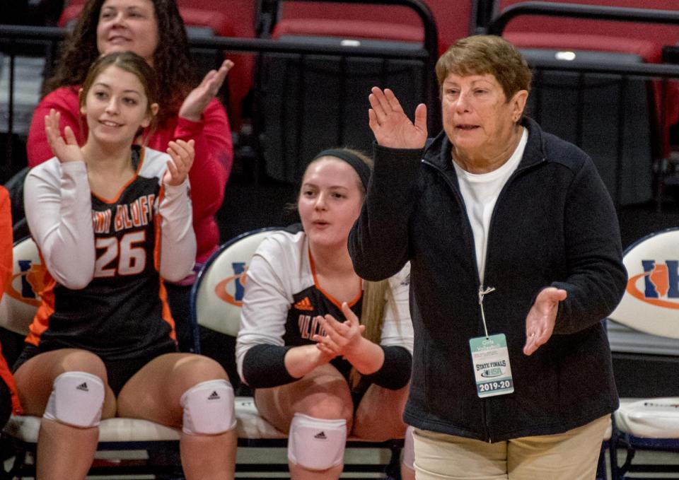 Illini Bluffs head coach Nancy Meyer cheers on her team near the end of the second set of their Class 1A volleyball state semifinal against Norris City-Omaha-Enfield on Friday, Nov. 15, 2019 at Redbird Arena in Normal. Illini Bluffs won in straight sets 25-19, 25-22 to advance to Saturday's title game.