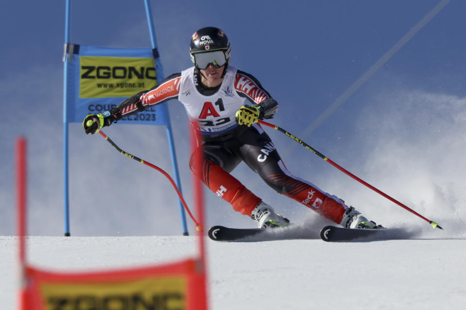 Canada's Marie Michele Gagnon speeds down the course during an alpine ski, women's World Championships super G, in Meribel, France, Wednesday, Feb. 8, 2023. (AP Photo/Alessandro Trovati)