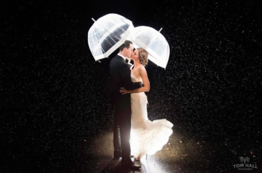 When rain destroyed a couple’s wedding venue, strangers stepped in to save the day (Photo: Instagram/tomhallphotography)