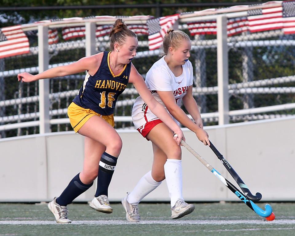 Hanover's Maren Hines defends Hingham's Haylen Wilson during second quarter action of their game at Hingham High School on Tuesday, Sept. 19, 2023. Hingham would go on to win 6-1.