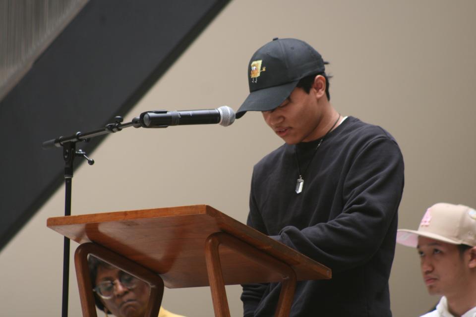 Win Naing recites his poem "Sand" during the NAACP Utica Oneida County Chapter Poet Laureate & Youth Poet Laureate Recognition Ceremony at Munson-Williams-Proctor Arts Institute on Saturday, April 30.