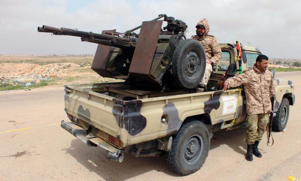 Troops allied to the UN-backed government deploy in Sirte, Libya.