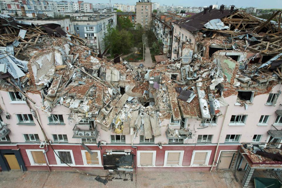 An aerial view taken on May 3, 2022 of the destroyed Hotel Ukraine in the northern Ukrainian city of Chernigiv, amid the Russian invasion of Ukraine.  Russia's withdrawal from Chernigiv after a month-long assault left behind a devastated city.