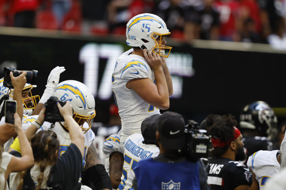 Los Angeles Chargers place kicker Cameron Dicker (15) celebrates after kicking a 37-yard field goal on the final play of an NFL football game against the Atlanta Falcons, Sunday, Nov. 6, 2022, in Atlanta. The Chargers won 20-17. (AP Photo/Butch Dill)