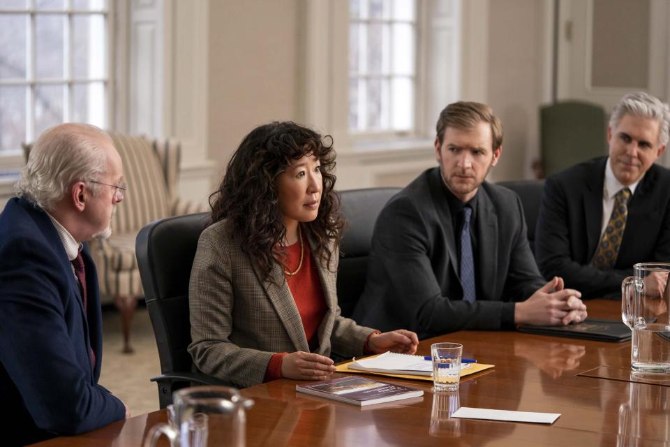 This image released by Netflix shows David Morse, from left, Sandra Oh, Cliff Chamberlain and Ian Lithgow in a scene from "The Chair." (Eliza Morse/Netflix via AP)