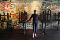 In this Thursday, May 21, 2020, image, Stephanie Byrd, co-owner of The Block, poses for a photo with chairs on the tables while the restaurant is closed due to the coronavirus in Detroit. She’s worried other black-owned businesses will struggle to withstand another wave of economic uncertainty during the pandemic, following decades of inequity that made it hard for many to flourish in the first place. (AP Photo/Paul Sancya)