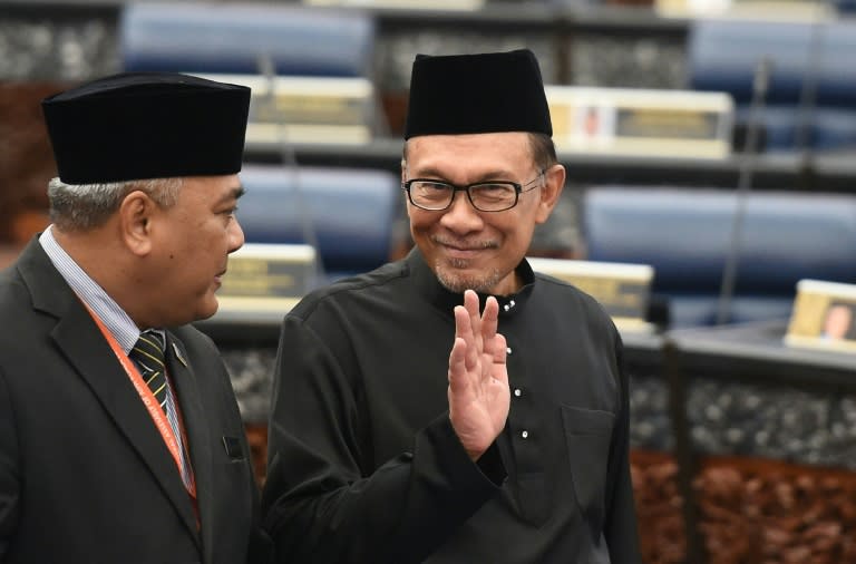 <span>馬來西亞首相預定接班人安華返回國會宣誓就任議員，（圖片來源：法新社）</span>