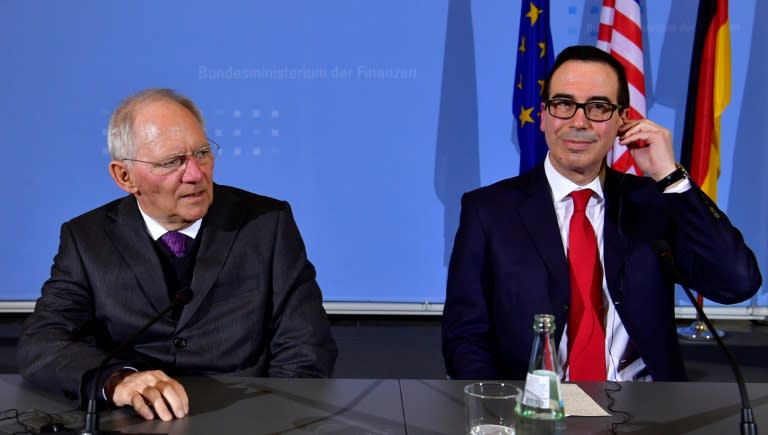 German Finance Minister Wolfgang Schaeuble (L) and US Secretary of the Treasury Steven Mnuchin attend a press conference at the finance ministry in Berlin