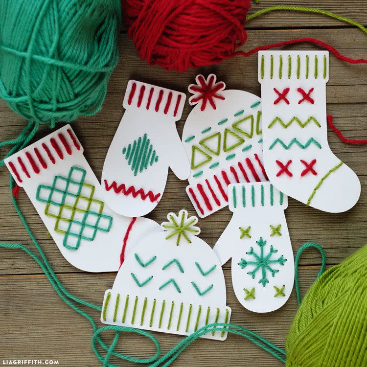<p>With a little yarn, you can create a card that's reminiscent of those warm, woolen mittens we all love so much. If you have a crafty kid at home, they could take this one, too.</p><p><a href="https://go.redirectingat.com?id=74968X1596630&url=https%3A%2F%2Fliagriffith.com%2Fchristmas-yarn-art-kids-craft%2F&sref=https%3A%2F%2Fwww.goodhousekeeping.com%2Fholidays%2Fchristmas-ideas%2Fg4080%2Fclever-diy-christmas-cards%2F" rel="nofollow noopener" target="_blank" data-ylk="slk:Get the tutorial at Lia Griffith »;elm:context_link;itc:0;sec:content-canvas" class="link "><em>Get the tutorial at Lia Griffith »</em></a></p>