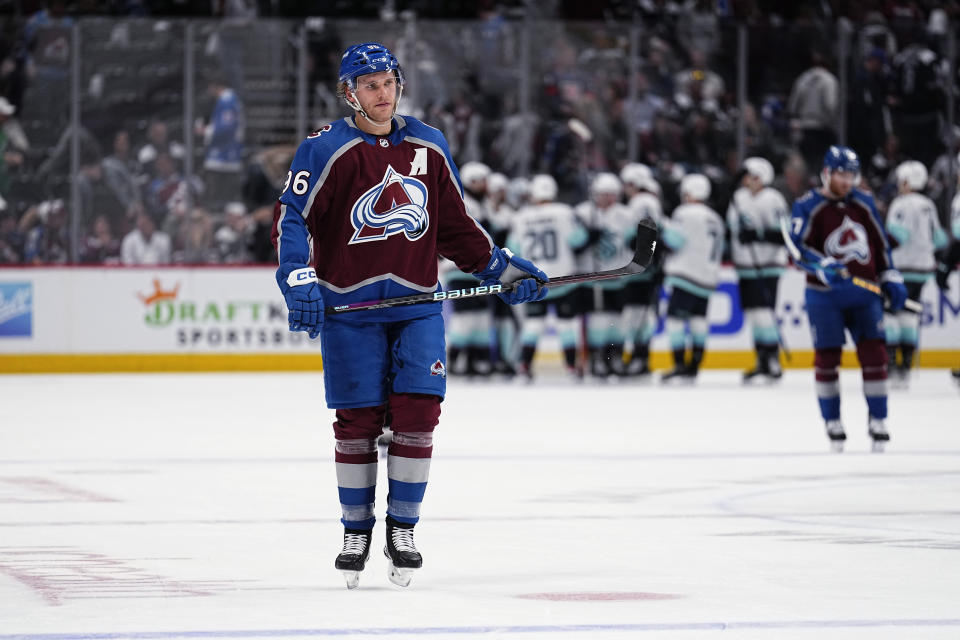 Colorado Avalanche right wing Mikko Rantanen (96) reacts to the team's loss to the Seattle Kraken in Game 1 of a first-round NHL hockey playoff series Tuesday, April 18, 2023, in Denver. (AP Photo/Jack Dempsey)