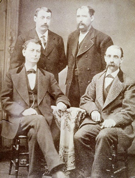 This 1872 photograph shows the founders of Kimberly-Clark. Seated are H. Babcock and J. A. Kimberly; standing are F.C. Shattuck and C.B. Clark.