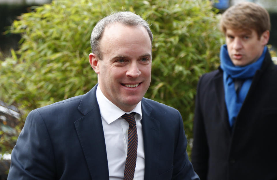 British Foreign Secretary Dominic Raab, left, arrives to meet with Italian Foreign Minister Luigi Di Maio, German Foreign Minister Heiko Maas, French Foreign Minister Jean-Yves Le Drian and European Union foreign policy chief Josep Borrell to discuss the situation in Libya at the EEAS building in Brussels, Tuesday, Jan. 7, 2020. The ministers will also hold talks later Tuesday which are expected to center on the situation in Iran and Iraq. (Francois Lenoir, Pool Photo via AP)