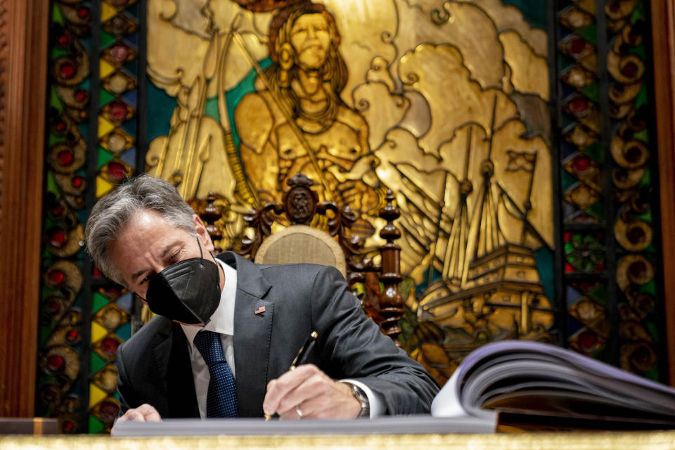 Secretary of State Antony Blinken signs a guest book as he arrives for a meeting with Philippine President Ferdinand Marcos Jr. at the Malacanang Palace in Manila, Philippines, Saturday, Aug. 6, 2022. Blinken is on a ten day trip to Cambodia, Philippines, South Africa, Congo, and Rwanda. (AP Photo/Andrew Harnik, Pool)