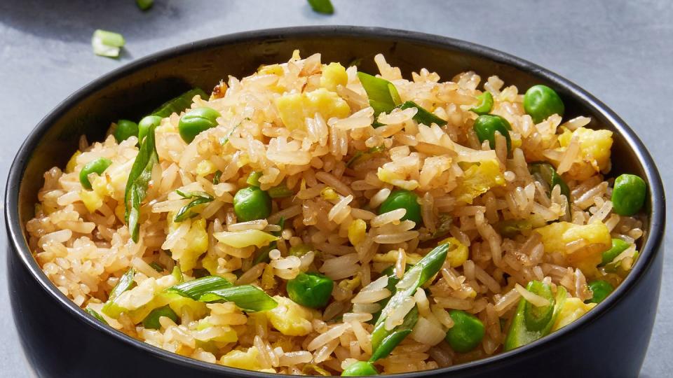 fried rice with peas, eggs, and green onions