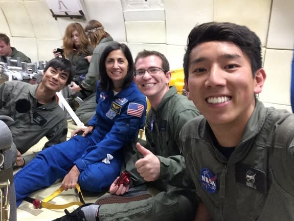 Caption: Victor Hong, NASA astronaut Nicole Stott, Andrew Beeler and Henry Lu pose for a selfie aboard a their zero-gravity flight on April 10, 2014.