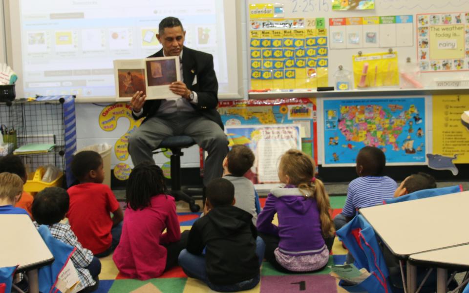 Juan Collins reads to a kindergarten class during a previous African American Read-In at Sealey Elementary School. This year's event will be at the Leon County Public Library on Feb. 17, 2024.