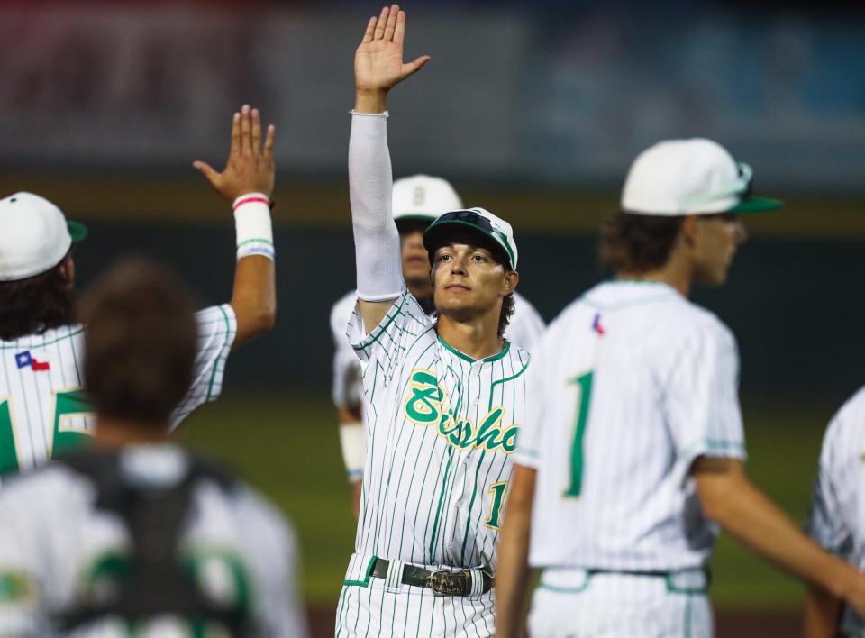 Bishop's Tye Odom (19) celebrates after a quarterfinal playoff game against Banquete at Cabaniss Field on May 18. The Badgers won by the mercy rule 10-0 in the fifth inning.