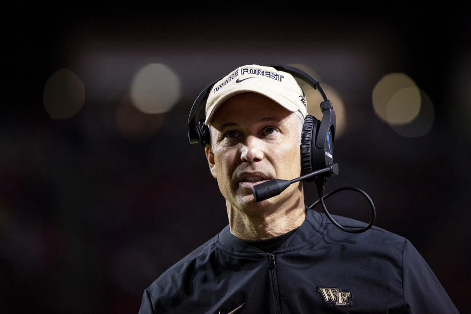 Wake Forest Head Coach Dave Clawson walks the sideline during an NCAA college football game against North Carolina State in Raleigh, N.C., Thursday, Nov. 8, 2018. (AP Photo/Ben McKeown)