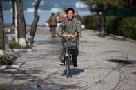 A man cycles near the waterfront in Wonsan, North Korea, October, 2016. Christian Peterson-Clausen/Handout via REUTERS