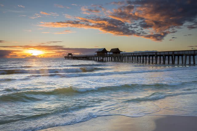 Danita Delimont. Naples pier at sunset.