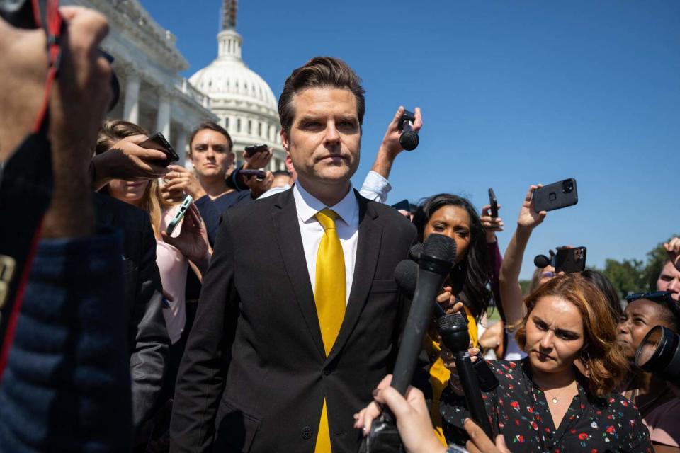 Rep. Matt Gaetz surrounded by journalists outside the U.S. Capitol