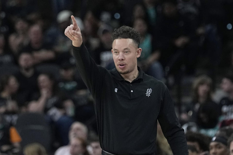 San Antonio Spurs assistant coach Mitch Johnson directs play during the first half of an NBA basketball game against the Indiana Pacers in San Antonio, Thursday, March 2, 2023. (AP Photo/Eric Gay)