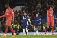 Chelsea's Cole Palmer, centre, celebrates after scoring his side's third goal during the English Premier League soccer match between Chelsea and Everton at Stamford Bridge stadium in London, Monday, April 15, 2024. (AP Photo/Ian Walton)