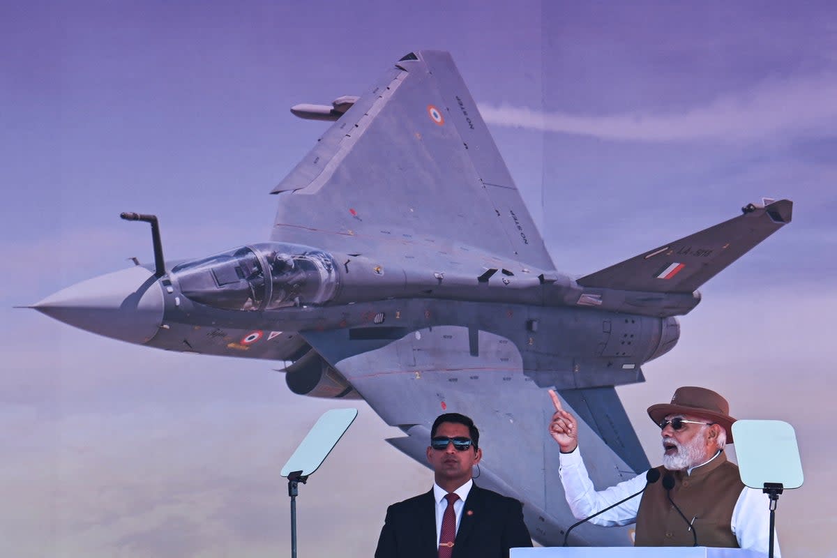 India’s prime minister Narendra Modi speaks during the inauguration of the 14th edition of ‘Aero India 2023’ at the Yelahanka air force station in Bengaluru (AFP via Getty Images)