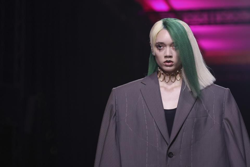 A model wears a creation for the Watanabe ready-to-wear Spring/Summer 2023 fashion collection presented Saturday, Oct. 1, 2022 in Paris. (Photo by Vianney Le Caer/Invision/AP)