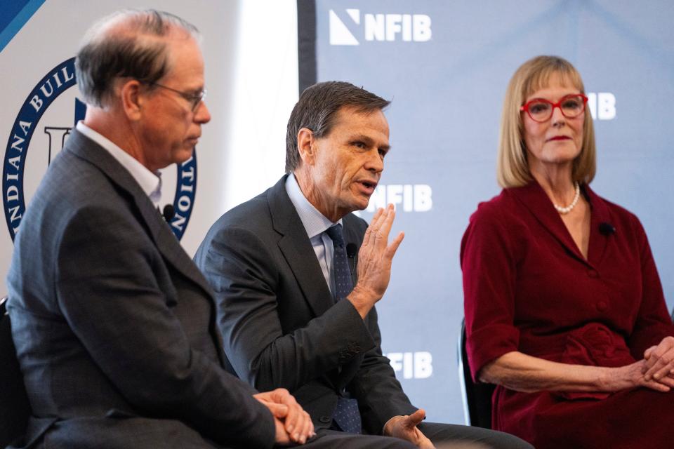 Brad Chambers, middle, addresses the audience during the National Federation of Independent Businesses gubernatorial candidate forum and luncheon on Tuesday, March 19, 2024, at the Wellington Fishers Banquet & Conference Center in Fishers, Indiana.