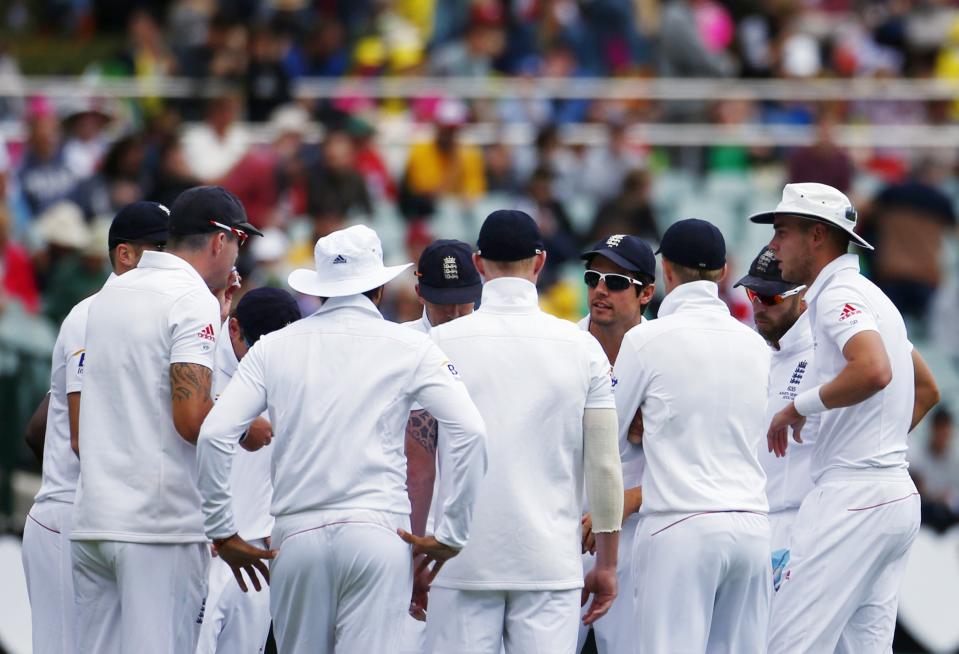 England's captain Alastair Cook (4th R) talks to his team on the Adelaide Cricket Ground before the first day's play of the second Ashes test cricket match against Australia in Adelaide December 5, 2013.