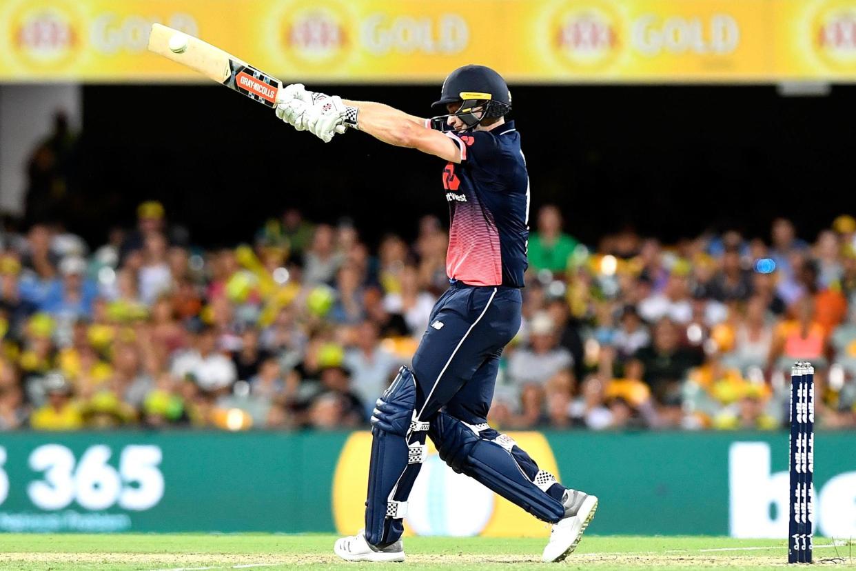 True grit: Chris Woakes guides England to victory at the Gabba: Getty Images