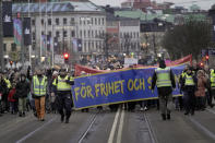 Protestors march as they demonstrate against the coronavirus measures including the vaccine pass, in Gothenburg, Sweden, Saturday, Jan. 22, 2022. (Bjorn Larsson Rosvall/TT News Agency via AP)