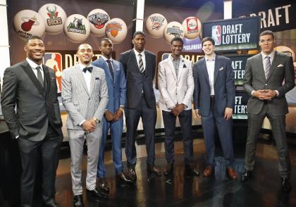 From left, NBA draft prospects Marcus Smart of Oklahoma State, Tyler Ennis of Syracuse, Andrew Wiggins and Joel Embiid of Kansas, Noah Vonleh of Indiana, Doug McDermott of Creighton and Aaron Gordon of Arizona during the draft lottery in May. (AP)