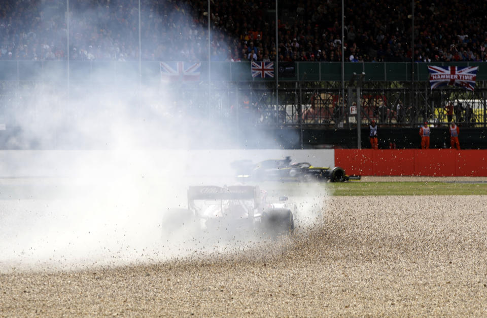 Alfa Romeo driver Antonio Giovinazzi of Italy steers his car out of the track during the British Formula One Grand Prix at the Silverstone racetrack, Silverstone, England, Sunday, July 14, 2019. (AP Photo/Luca Bruno)