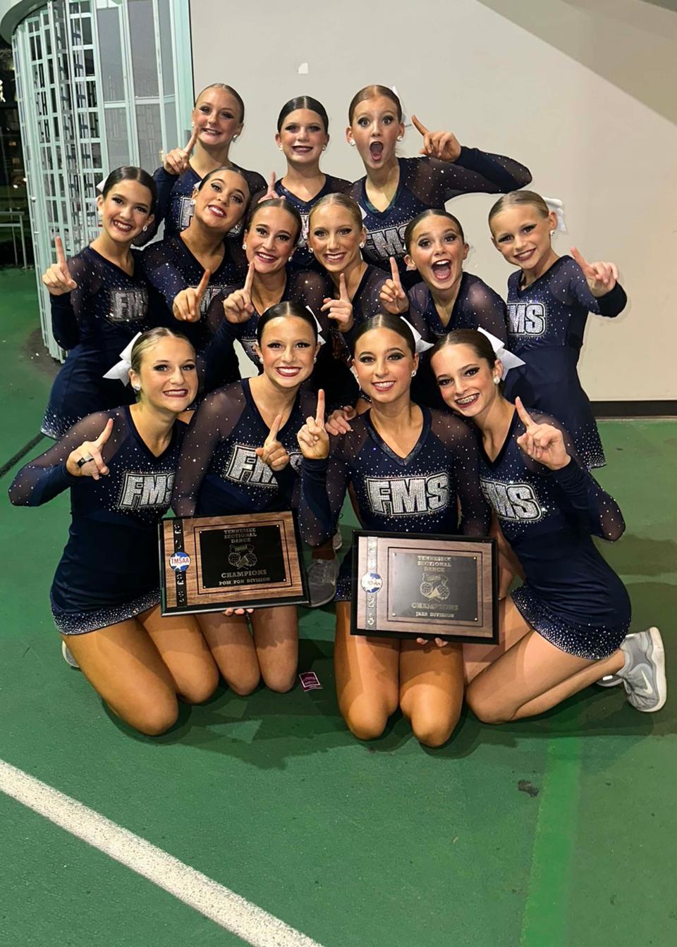 The Farragut Middle School dance team wins a state championship for their pom routine in Nashville, Nov. 2023.
