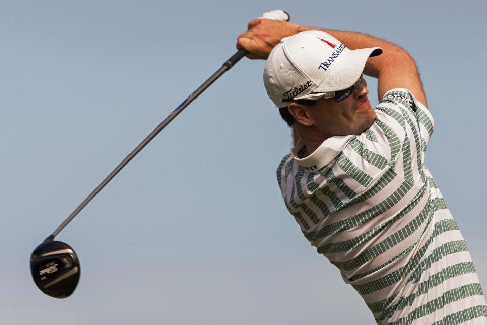 Zach Johnson drives on the 16th tee during the second round of the Tournament of Champions golf tournament, Saturday, Jan. 4, 2014, in Kapalua, Hawaii. (AP Photo/Marco Garcia)