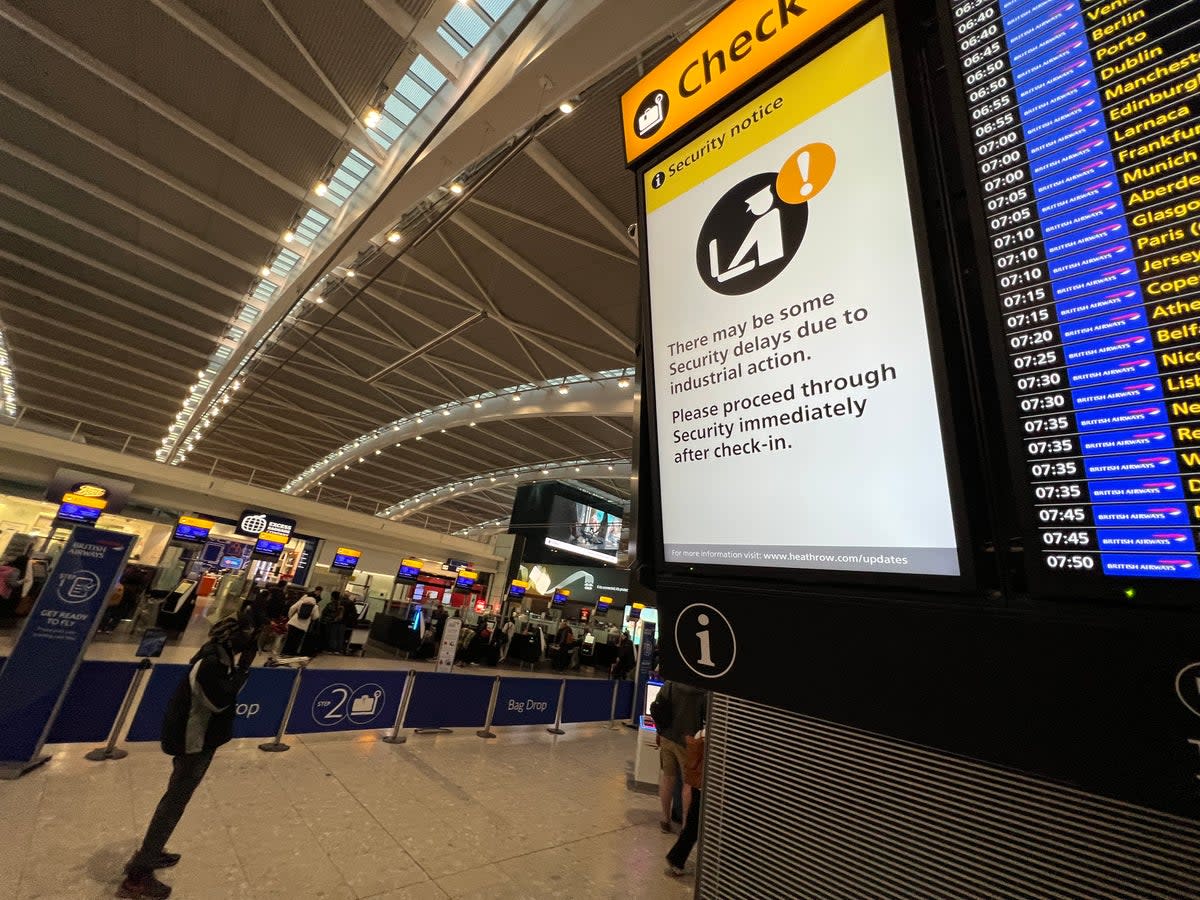 Go slow? Signs at Heathrow airport Terminal 5 warn of possible delays at security, where another strike is under way  (Simon Calder)