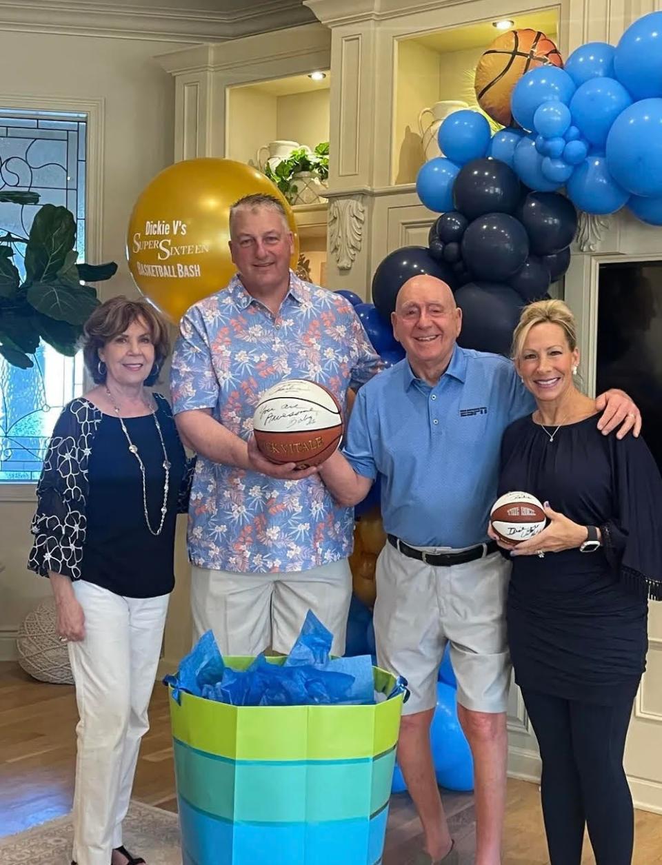 From left, Lorraine Vitale, Charlie Johnson, Dick Vitale, and Tammie Johnson at Vitale's home in Lakewood Ranch. Last year, Tammie won the first Super Sixteen Basketball Bash.