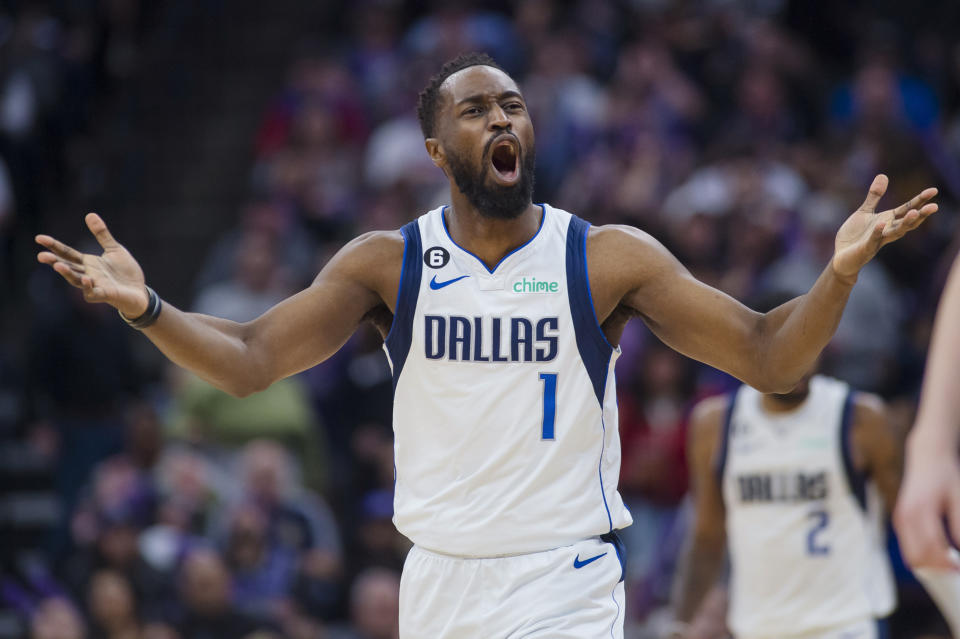 Dallas Mavericks guard Theo Pinson reacts to an official's call during the second half of the team's NBA basketball game against the Sacramento Kings in Sacramento, Calif., Friday, Feb. 10, 2023. The Mavericks won 122-114. (AP Photo/Randall Benton)